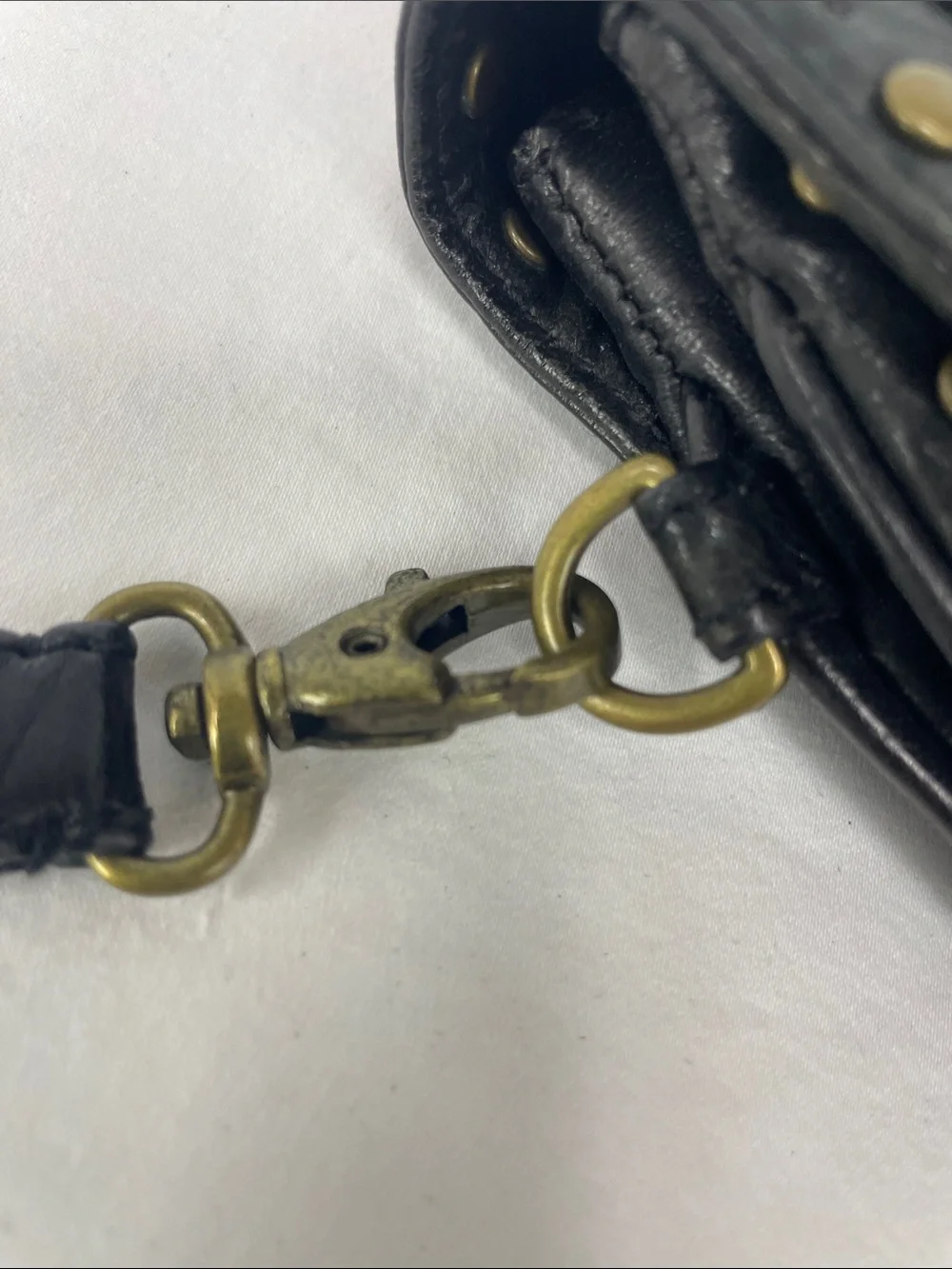 Kooba Black Leather Studded Wristlet Clutch with Brass Accents